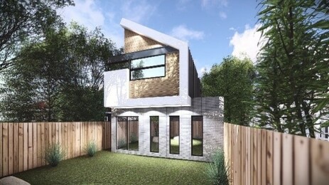 Modern two-story house with angular roof and large windows.