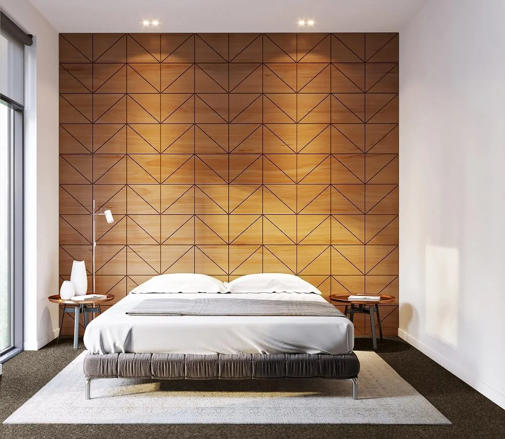 Modern bedroom with geometric wooden wall and minimalist decor.