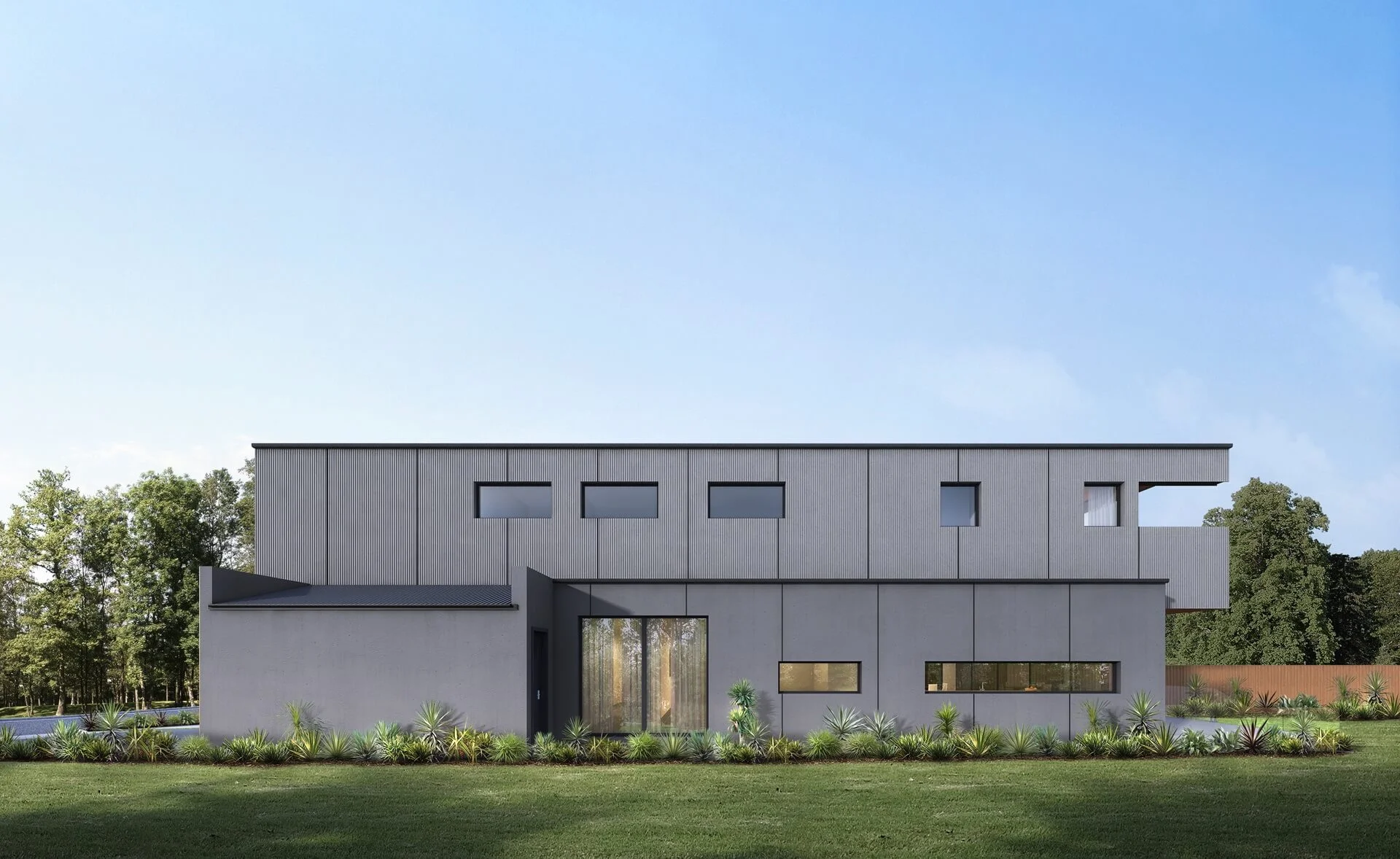 Modern house with a sleek, gray exterior and large windows.